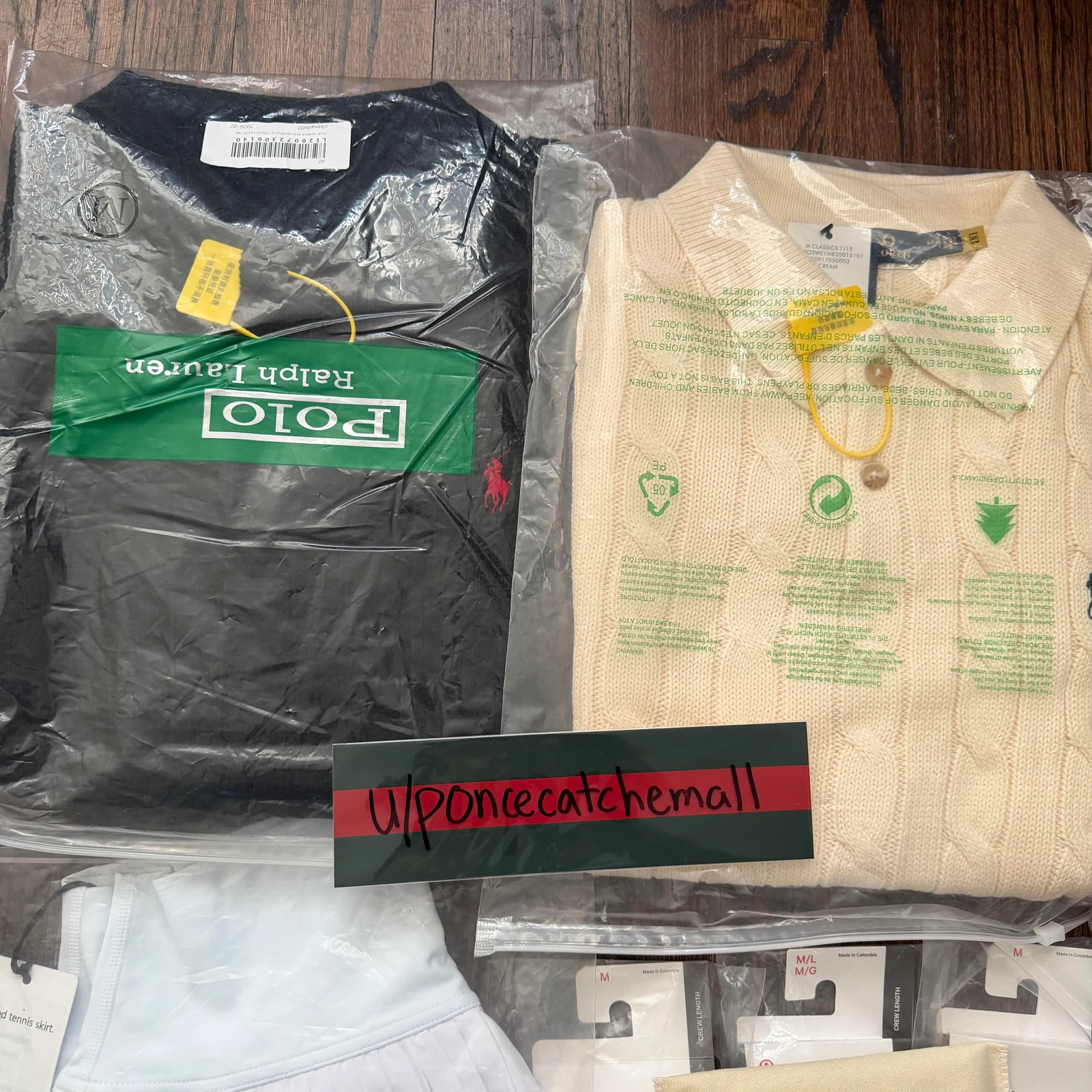 Black and beige Ralph Lauren cable-knit polos laid out together